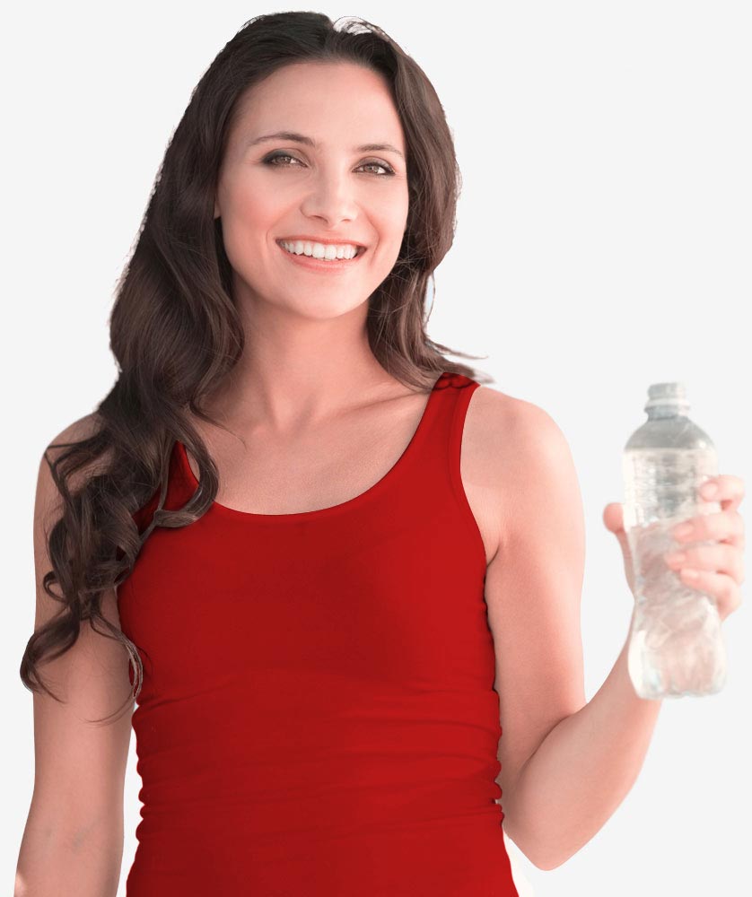 Happy employee drinking a bottle of water